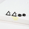 Macro shot of minimalist 18K gold stainless steel triangle earrings with 0.8cm size detail - 009 Black Triangle