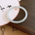 Elegant white crystal jade bangle with a smooth round design in Chinese retro style - Chinese Retro Greenish White Jade Round Bangle (57#)