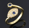 Bague ajustable œil protecteur en or avec zircons colorés et cristal bleu foncé - Mauvais œil