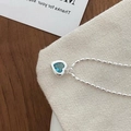 Silver bead chain bracelet featuring a heart-shaped sky blue gemstone charm - Cyan Heart Necklace
