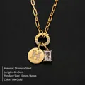 Gold stainless steel necklace featuring crystal studded letter H and a rectangular gemstone - Letter H / Gold