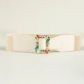 Dettaglio della cintura elastica larga con fibbia dorata decorata con gemme colorate - Beige