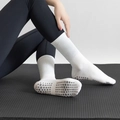 White mid-calf yoga socks with non-slip silicone grips for pilates and indoor fitness - One Size / White