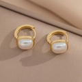 Square cat eye stone gold hoop earrings with iridescent luster on beige fabric background - Square Pearl Stud Earrings (851 Earrings)