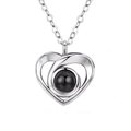 Silver heart-shaped projection necklace with a black round stone on a white background - Three-hole Heart Silver