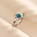 Detail of vintage adjustable ring featuring radial sunburst setting and blue turquoise stone - Silver-Dark Blue Turquoise
