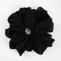 Detail of high-elasticity black chiffon scrunchie showing its soft texture and pleats - Black