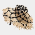 Macro detail of two-tone raffia sun hat showing woven texture and raw fringe edges - M (56-58cm) / Black
