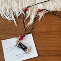 Detail of ceramic dachshund pendant with black and white woven rope and red beads - Silver Black Dachshund (WN1666)