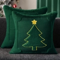 Close-up of green plush pillow covers with yellow embroidered Christmas trees on a sofa - 18x18 Inch / Green Christmas Tree Star