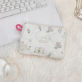 Close-up of quilted cotton cosmetic bag with cute rabbit print and pink zipper handle - Rabbit Paradise