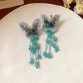 Vintage embroidered butterfly drop earrings with blue beads and long floral tassels - Fabric Glass Knitted Flower Stud Earrings