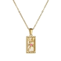 Detail of gold Tarot card pendant featuring The Lovers design with a pink heart charm - LOVERS / Steel