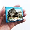 Detail of blue stamp-shaped resin fridge magnet featuring Colosseum Rome 3D relief - Colosseum Stamp