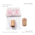 Miniature beech wood stamp featuring a cherry pudding design from the Small Bakery Series - Cherry Pudding