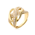Macro shot of gold-plated geometric ring with micro-paved cubic zirconia stones - Adjustable Open / Gold Knot