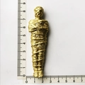 Golden Egyptian mummy resin souvenir magnet measured with a ruler at eight centimeters - Golden Egyptian Mummy