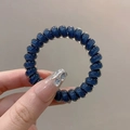 Navy blue spiral telephone wire hair tie made of high-elasticity translucent plastic - Single Piece / Jelly Blue
