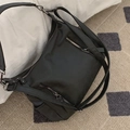 Versatile black waterproof nylon tote bag with dual front zippers and adjustable strap - Black