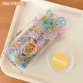 Set di 100 elastici per capelli colori macaron in barattolo trasparente portaoggetti - 9x5,5cm in Scatola / Serie Colorata (500 Pezzi)