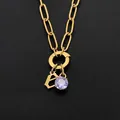 Stainless steel necklace with letter E pendant and purple crystal in gold finish, SKU - Lowercase e