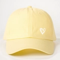 Close-up of heart print detail on a soft cotton light yellow baseball cap with air vents - One Size / Goose Yellow
