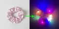Pink satin LED scrunchie showing daylight look and colorful glowing effect comparison - Lighted-Dusty Pink