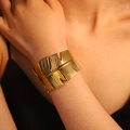 Fashionable gold leaf open cuff bracelet with vertical texture for women in boho style - Falling Leaves