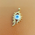 Golden Evil Eye pendant with blue and white zircon stones on brown leather background - 8-Gold Flame Blue Eye Zircon
