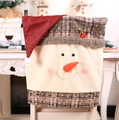 Christmas snowman chair cover with 3D carrot nose and plaid hat for festive dining decor - Christmas Snowman Style