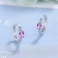 Detail showing elegant purple oval zircon earrings with silver hoop and micro-set crystals - Purple Zirconia