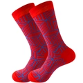 Detail van rode sokken met blauwe geometrische patronen en elastische geribbelde boorden - Eén maat / Rood/Blauw Geometrisch
