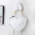 White heart-shaped faux fur bag with golden chain strap and soft fluffy texture - White