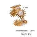 Detail view of 18K gold plated ring with sun patterns and size measurements 17.4mm - White