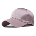 Close-up of pink satin baseball cap featuring glossy fabric and neat stitching detail - Adjustable / Pink