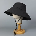 Detail of black wide brim sun hat with adjustable drawstring on display stand - M (56-58cm) / Black