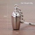 Metallic cocktail shaker keychain in silver finish on brown wooden background - Cocktail Shaker (Silver)