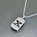 Detail view of silver stainless steel necklace with hollow rectangle letter X pendant - Letter X