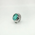 Vintage silver ring watch featuring a large green oval gemstone with carved flower details - Lake Blue