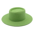 Detail view of the flat-top grass green straw hat with woven texture and wide brim - M (56-58cm) / Grass Green
