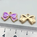 Purple polka dot enamel bow pendant in gold alloy with size reference guide - Purple Bow