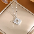 Silver-toned titanium steel necklace with a square cubic zirconia pendant on jewelry box - A0109 Silver Quadrilateral