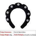 Thick black padded sponge headband featuring elegant white pearls with metal floral bases - Pearl Terry Cloth Headband / Black