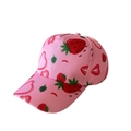 Close-up of pink cotton baseball cap featuring vibrant all-over strawberry pattern prints - Strawberry Heart