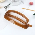 Brown tortoiseshell rectangular hair claw clip with glossy finish and spring mechanism - Yellow Brown