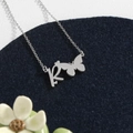 Stainless steel O-chain necklace featuring letter R and butterfly pendant in silver finish - Silver R
