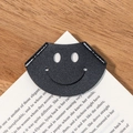 Handmade black PU leather corner bookmark with smiling face design for students - Black