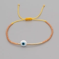 Bracciale Miyuki fatto a mano con ciondolo occhio blu in rosa e finitura dorata - Rosa Arancio (MI-B200498O)