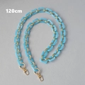 Detailed view of 120cm blue acrylic and gold metal chain strap with lobster clasps - 120cm / Blue