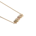 Detailed close-up of gold MAMA necklace featuring rainbow zircon gemstones on white background - Classic MAMA